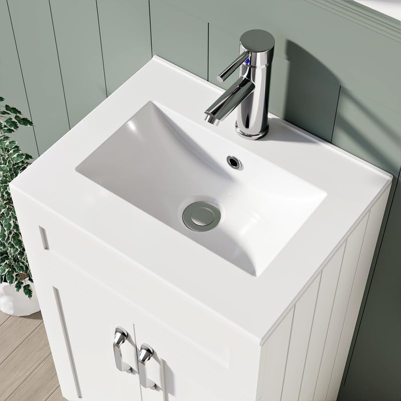 Close-up of white integrated sink with chrome faucet on 500mm matt white vanity unit